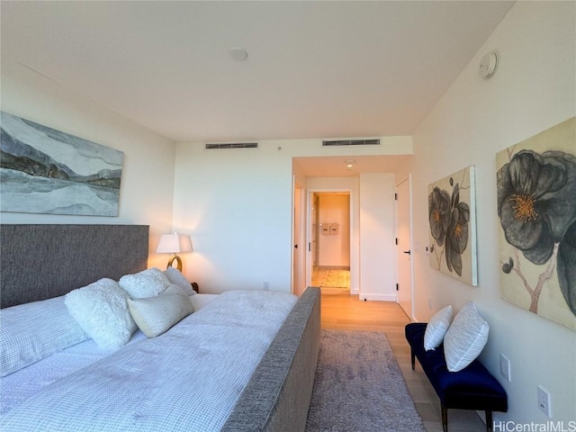 bedroom featuring light hardwood / wood-style floors