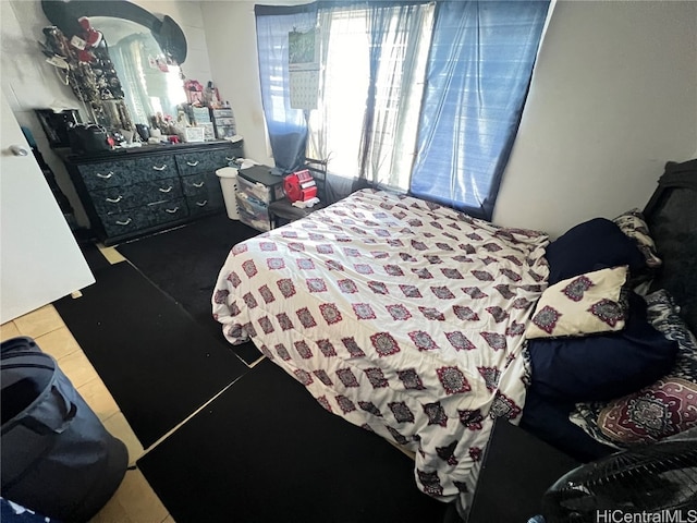 bedroom featuring tile patterned floors