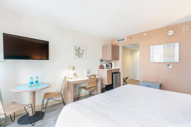 bedroom featuring light wood-type flooring