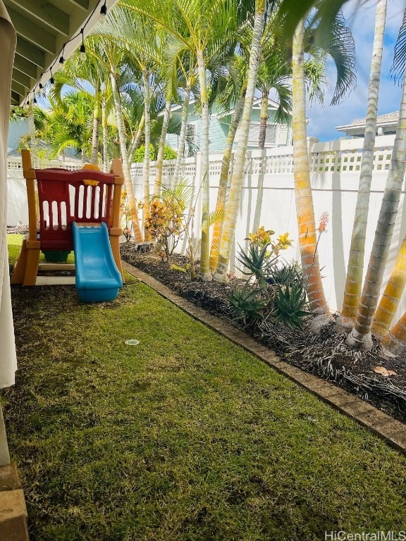 view of yard with a playground