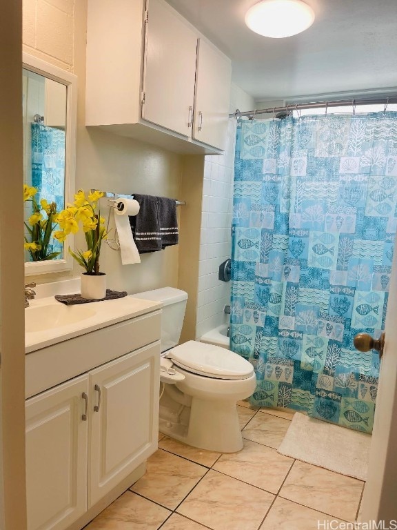 full bathroom with toilet, shower / bath combo, tile patterned floors, and vanity