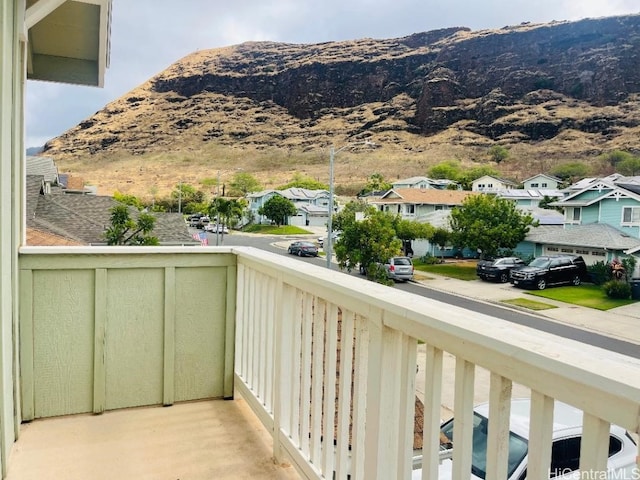 balcony featuring a mountain view