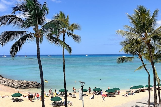 property view of water featuring a beach view