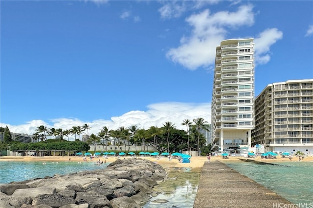 view of swimming pool featuring a water view