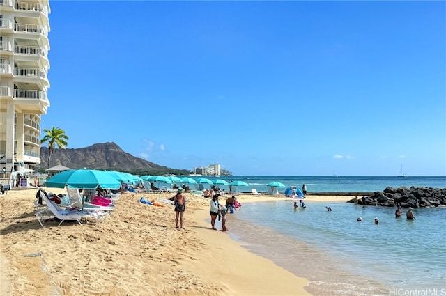 view of water feature with a beach view