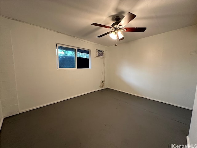 empty room featuring ceiling fan and a wall mounted AC