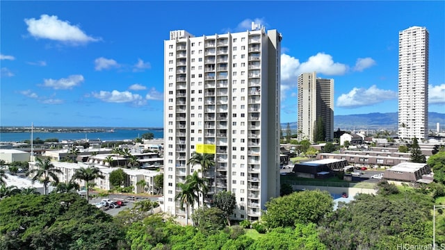 view of building exterior with a water view