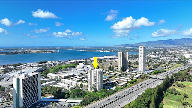 aerial view featuring a water and mountain view