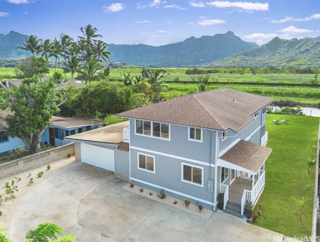 drone / aerial view featuring a mountain view