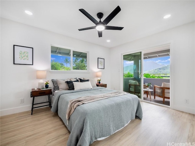 bedroom with ceiling fan, light wood-type flooring, and access to outside