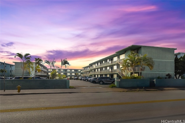 view of outdoor building at dusk