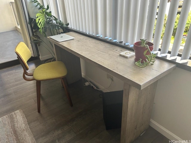 411 Hobron Ln Unit 912, Honolulu, HI 96815 - home office featuring dark wood-type flooring and built in study area