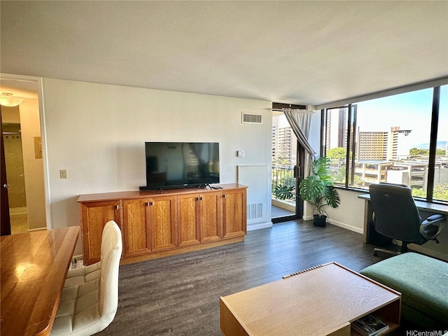 411 Hobron Ln Unit 912, Honolulu, HI 96815 - living area featuring dark wood-style floors and a desk