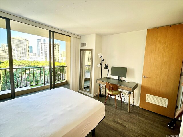 411 Hobron Ln Unit 912, Honolulu, HI 96815 - bedroom featuring access to outside, dark wood-style flooring, and an office area