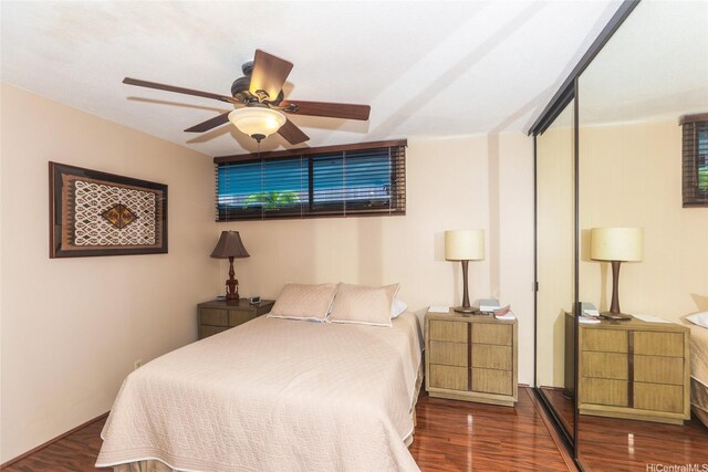 1088 Bishop St Unit 1125, Honolulu, HI 96813 - bedroom with wood finished floors and a ceiling fan