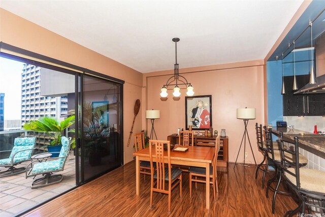 1088 Bishop St Unit 1125, Honolulu, HI 96813 - dining room with wood finished floors, a chandelier, and a view of city