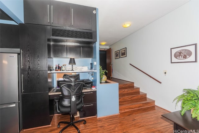 office space with hardwood / wood-style floors