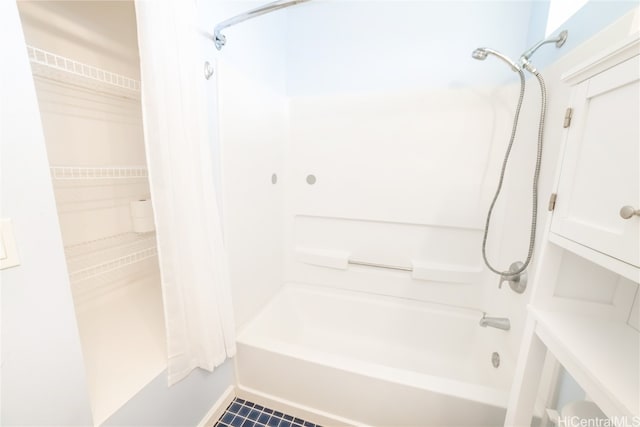 bathroom featuring shower / tub combination and tile patterned flooring