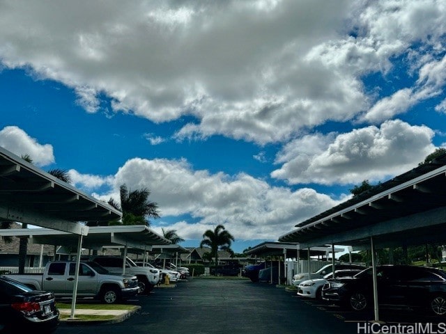 view of car parking with a carport