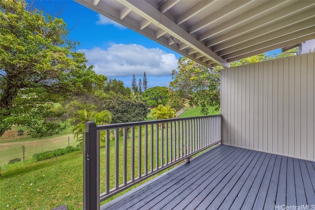 deck featuring a lawn