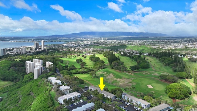 drone / aerial view featuring a water and mountain view