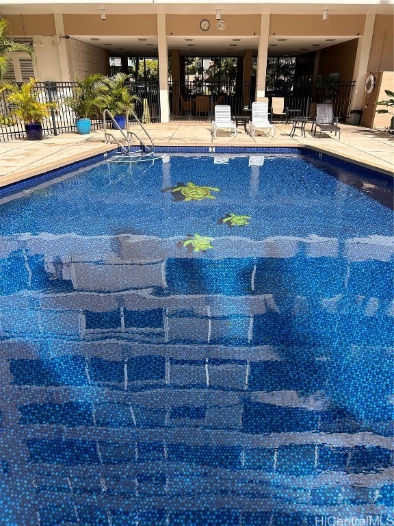 view of pool with a patio