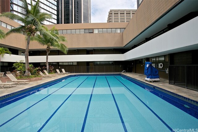 view of swimming pool featuring a patio