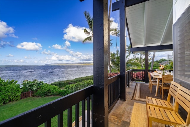 balcony featuring a water view