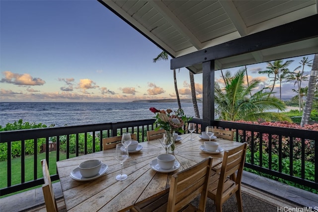 deck at dusk with a water view