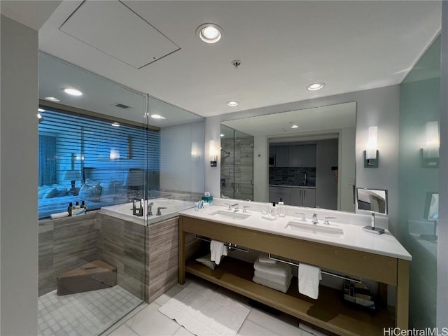 bathroom with a bathtub and vanity