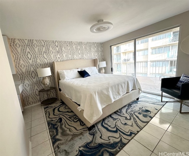 tiled bedroom featuring access to exterior