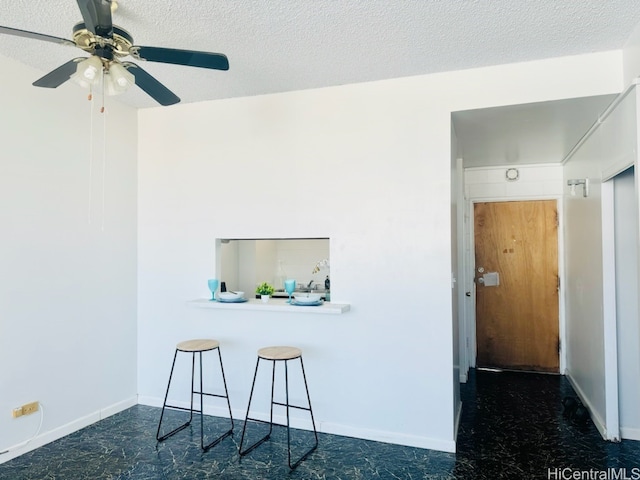 interior space with a textured ceiling