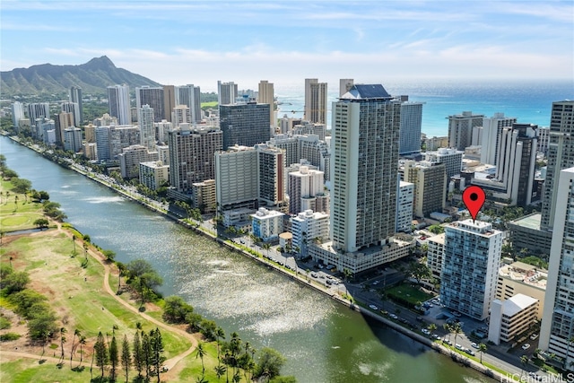 city view featuring a water and mountain view