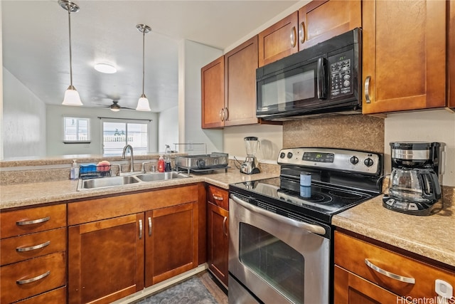 kitchen featuring ceiling fan, stainless steel electric range oven, sink, and hanging light fixtures