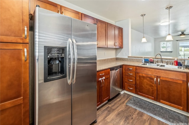 443 Manawai St Unit 1503, Kapolei, HI 96707 - kitchen featuring stainless steel appliances, a sink, dark wood-style floors, hanging light fixtures, and light countertops