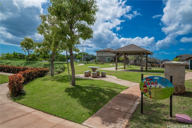 view of community featuring a gazebo and a yard