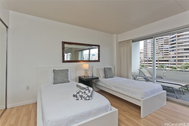 bedroom featuring light wood-type flooring