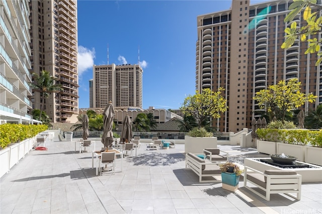 surrounding community featuring a patio area