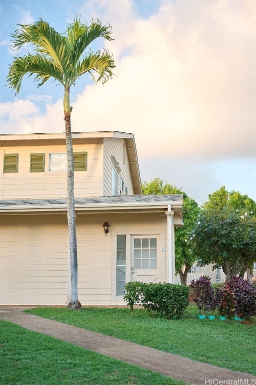 exterior space with a lawn