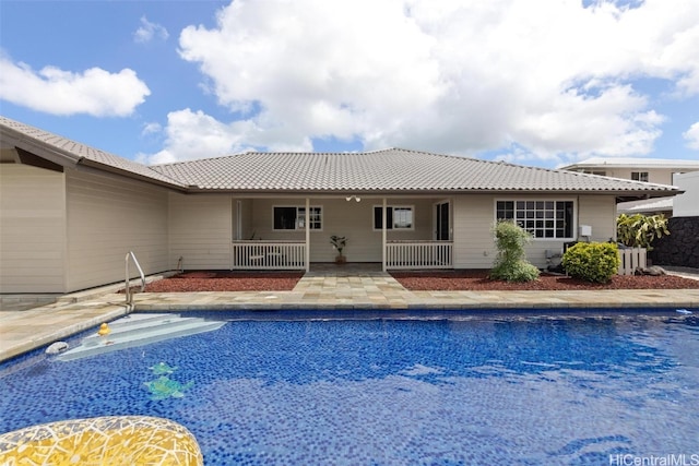 view of pool with a patio area