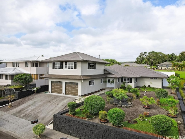 view of front of home with a garage