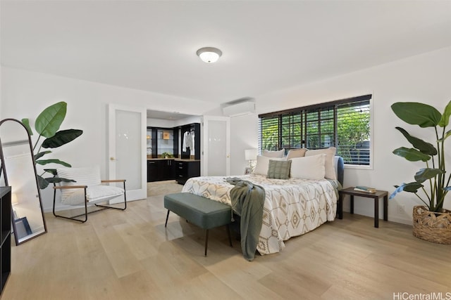 bedroom with light wood-type flooring