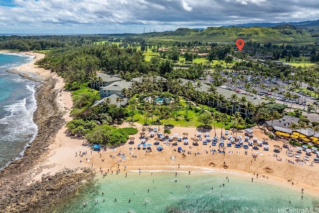 aerial view featuring a water view and a beach view