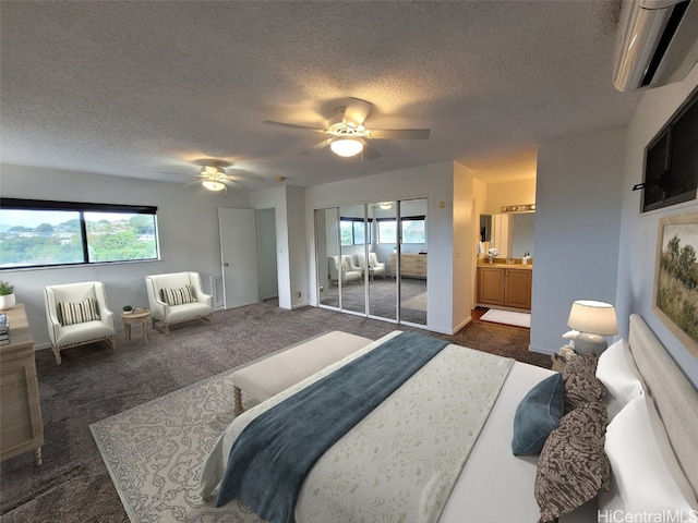 bedroom with ceiling fan, multiple windows, a wall mounted AC, and dark carpet