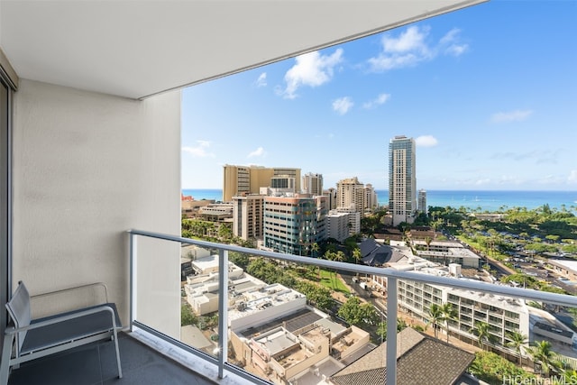 balcony featuring a water view