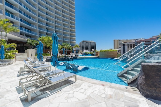 view of pool featuring a patio