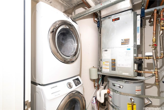 laundry room with stacked washer and clothes dryer