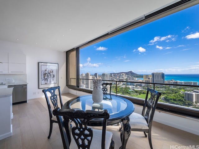 balcony featuring a water view