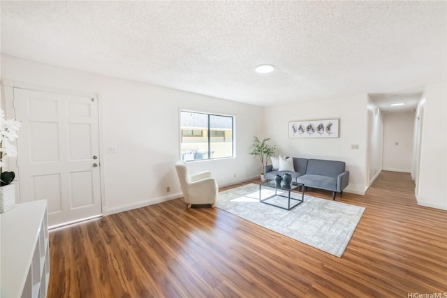 83 Iho Iho Pl, Wahiawa, HI 96786 - entrance foyer featuring wood finished floors and a textured ceiling