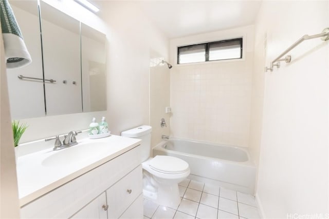 full bathroom with vanity, tile patterned flooring, tiled shower / bath, and toilet